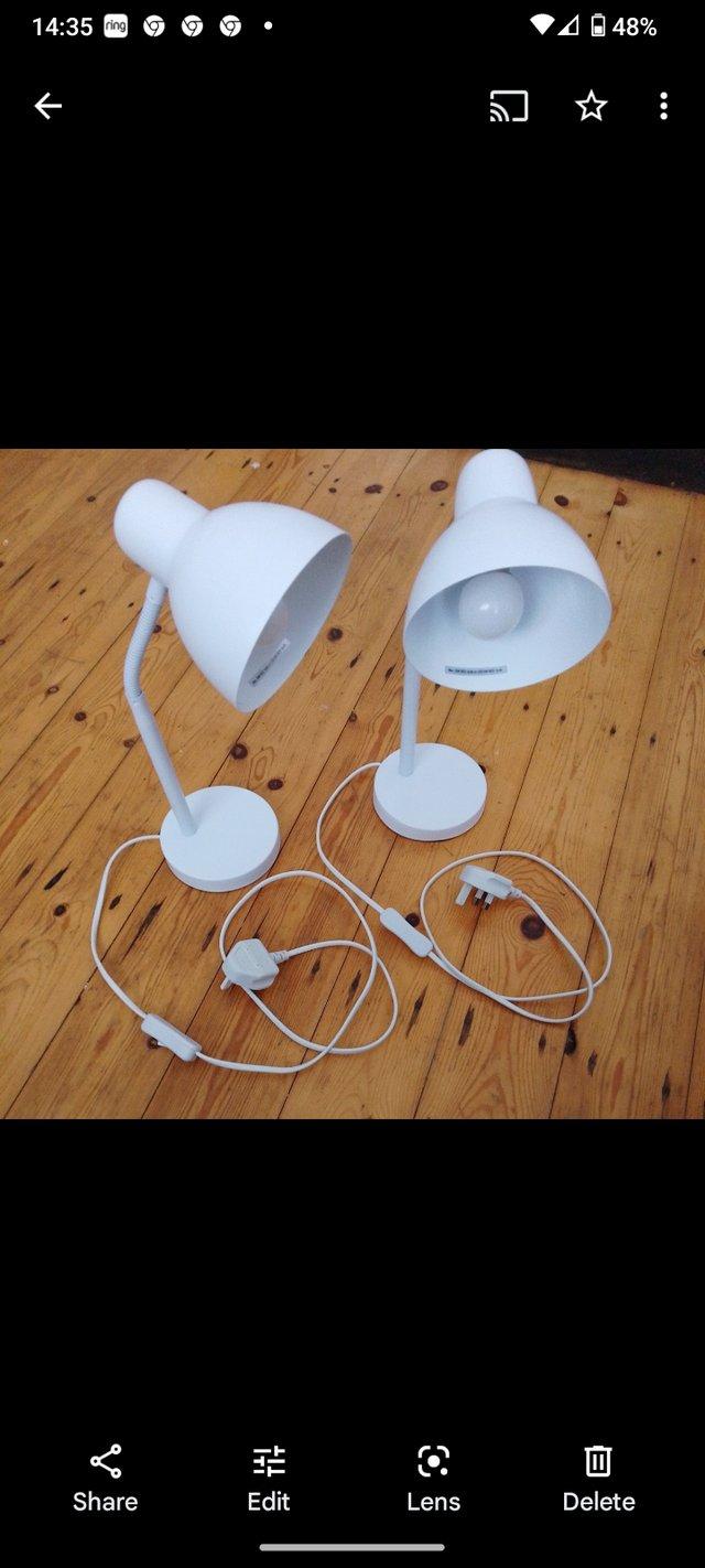 Preview of the first image of 2 white adjustable lamps with bulbs..