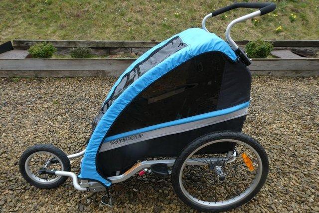 Preview of the first image of 3 in 1 Weeride Bicycle Trailer/Jogger/Stroller for 1 child.