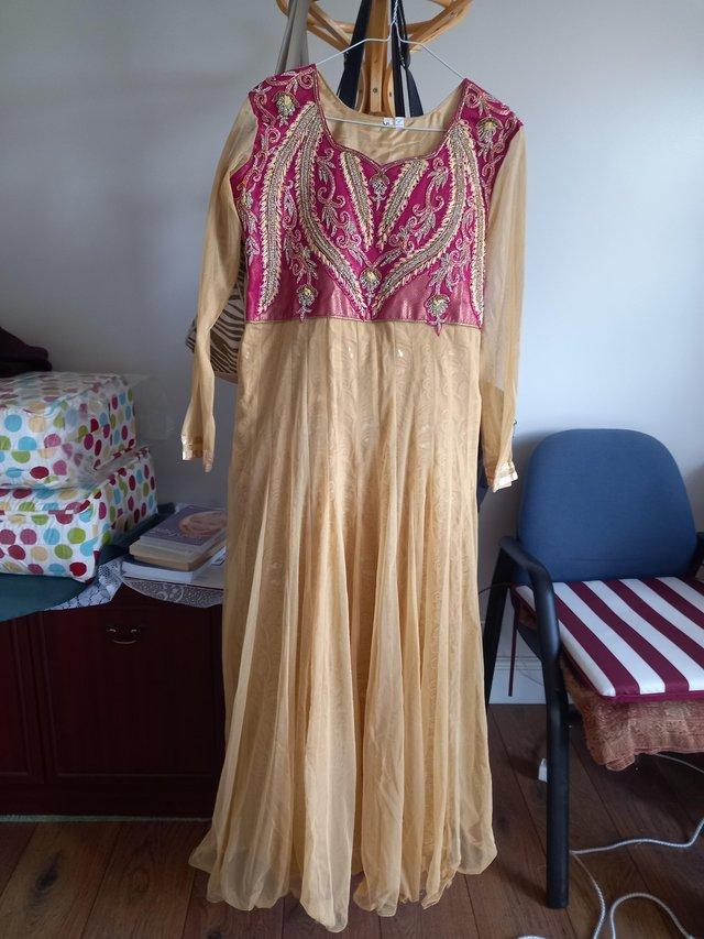 Preview of the first image of Long dress with lining worn once only.