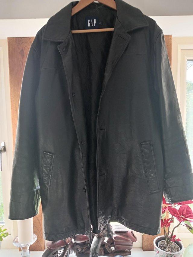 Preview of the first image of Men's leather jacket in black by Gap large 44.