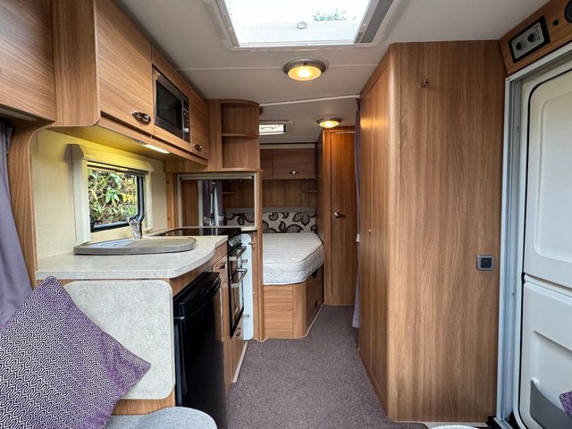 Preview of the first image of Swift Ace Envoy 2013 4 Berth Caravan with Fixed Bed.