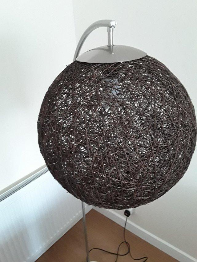 Preview of the first image of Standard LAMP WITH RATTAN SHADE.