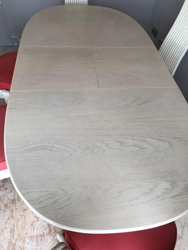 Preview of the first image of G plan dining table and six chairs.
