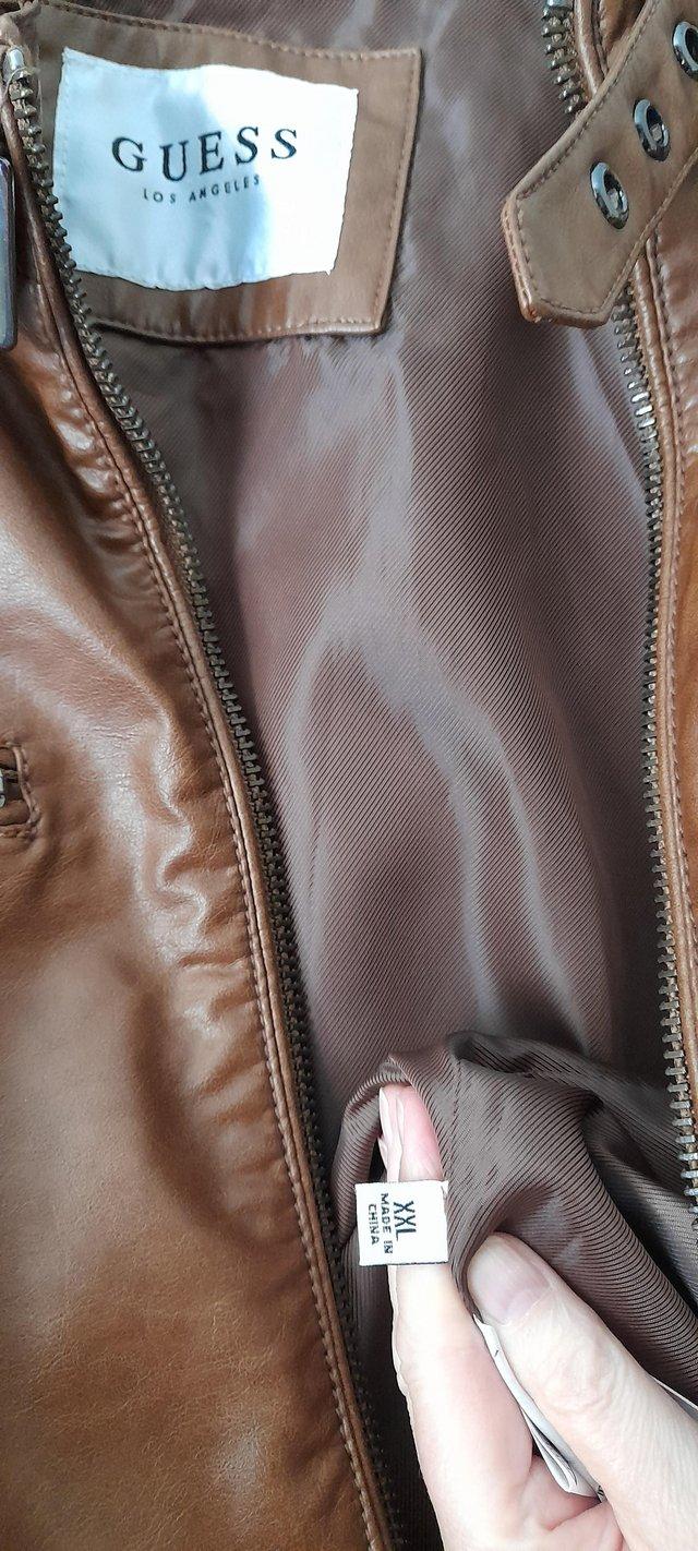 Preview of the first image of Mens Guess brown faux leather jacket size XXL.