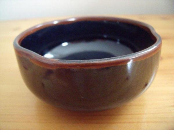 Image 1 of Attractive highly glazed dark blue/brown dish- ‘pinched’ rim