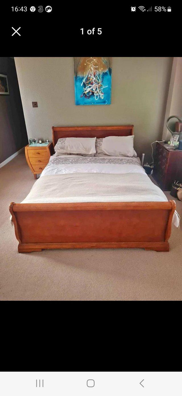Preview of the first image of Solid wooden Oak sleigh double bed frame.