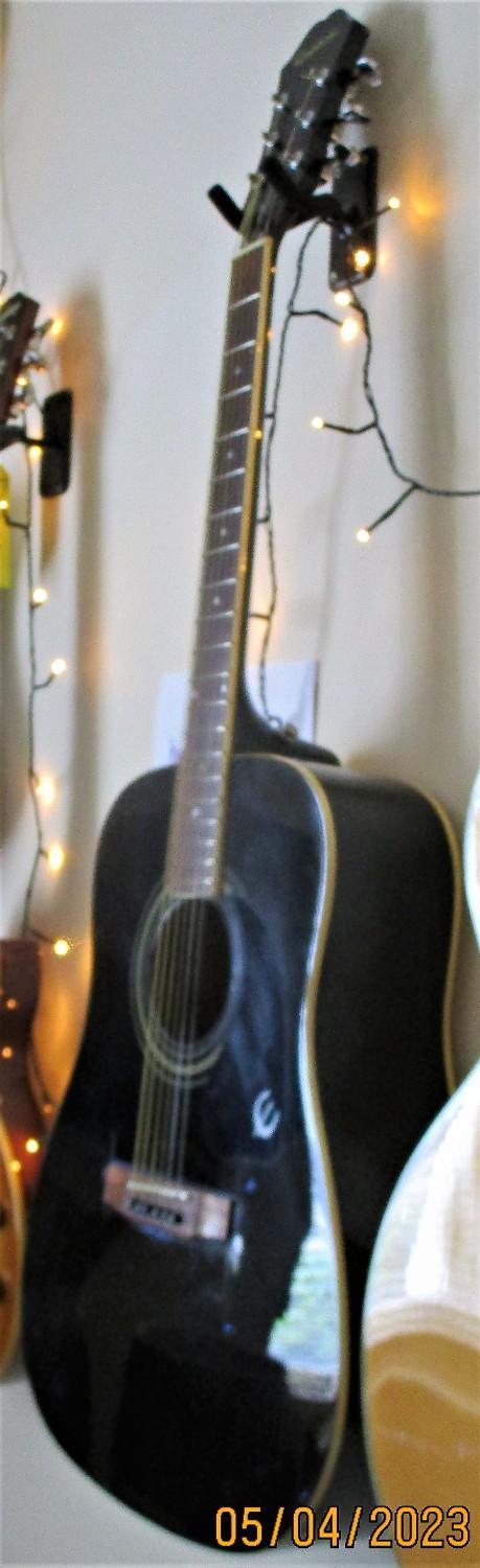 Preview of the first image of Epiphone DR100 Acoustic Dreadnought.