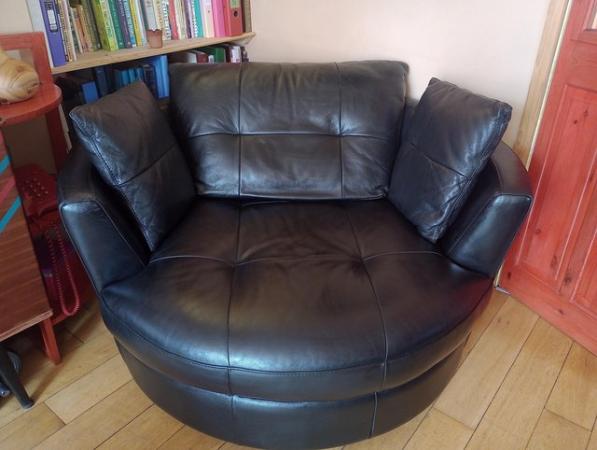 Image 2 of DFS black leather 2 seater swivel cuddler great condition