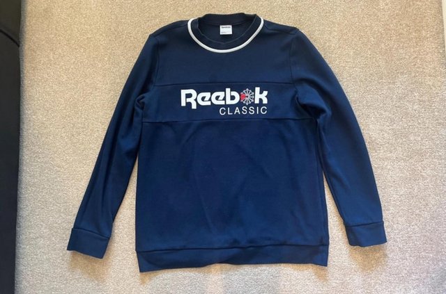 Preview of the first image of Vintage Reebok jumper perfect condition.