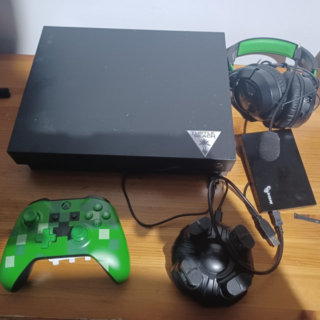 Preview of the first image of Xbox one x 1td in black in great condition.