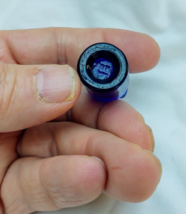 Preview of the first image of Miniature Cobalt Blue Poison Bottle.