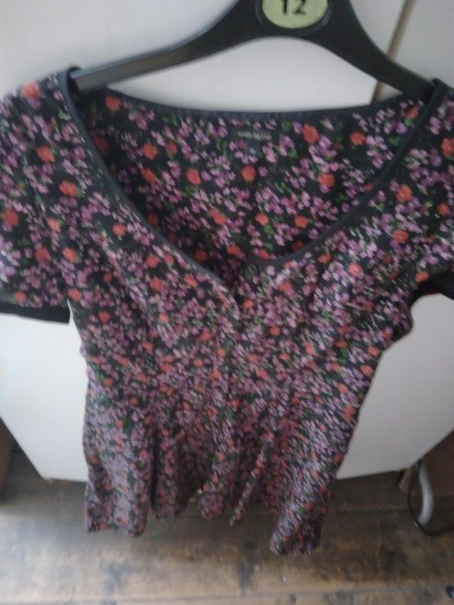 Preview of the first image of Vintage River Island floral printed black dress.