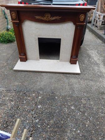 Image 1 of Solid wood fireplace surround / marble hearth and panel.