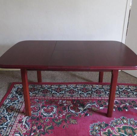 Image 1 of Extendable Mahogany colour dining table
