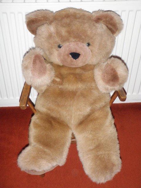 Preview of the first image of LARGE SOFT CUDDLY BROWN TEDDY BEAR.