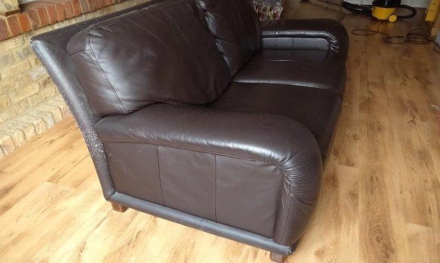 Image 2 of Sofa 2 seater brown leather. Fair condition