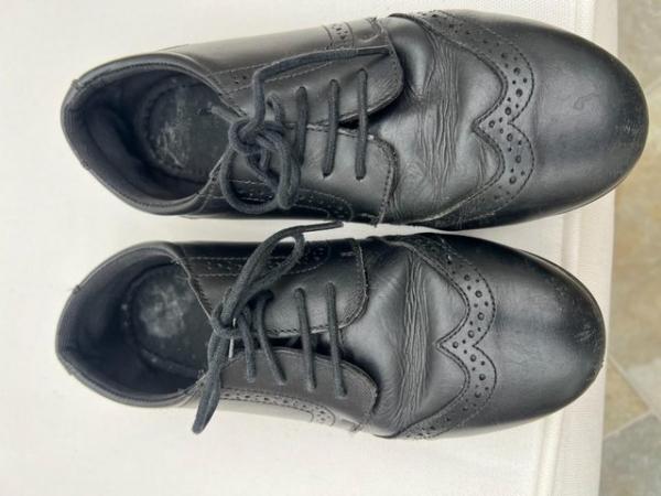 Image 1 of Girls school shoes. Black with laces