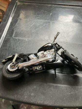 Image 2 of Model of black motorcycle with stand