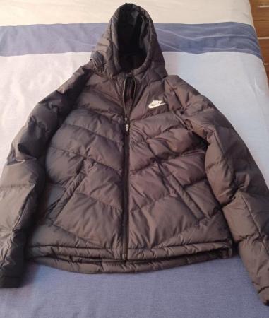 Image 1 of Black Nike children's coat in size XL (13-14 years)