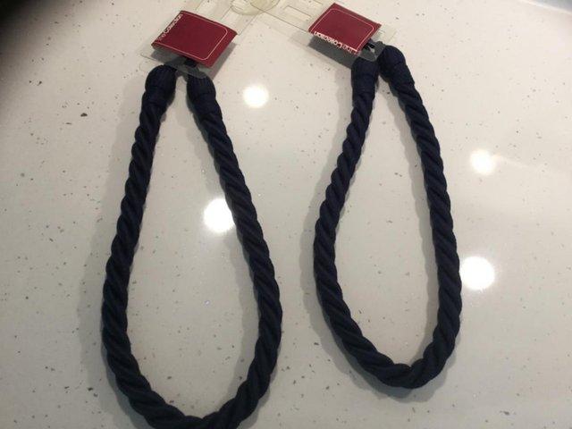 Preview of the first image of BRAND NEW- navy rope tie backs (pair).