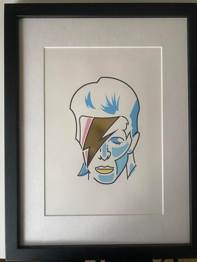 Preview of the first image of 2 framed David Bowie prints for sale.