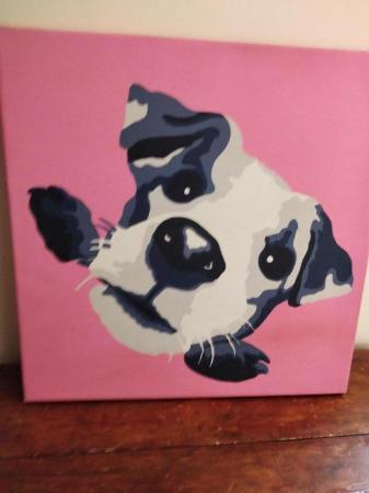 Image 1 of Dog head pictures. 1 pink, 1 blue
