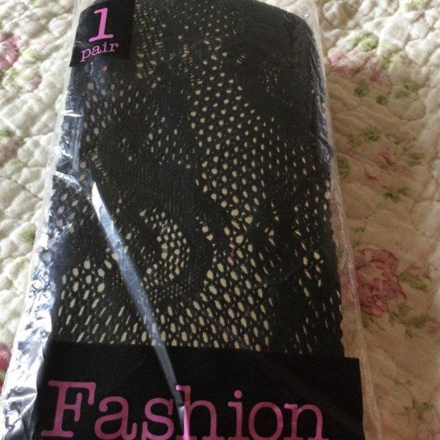 Preview of the first image of Size S Black Lacey Tights BNIP, Never Worn..
