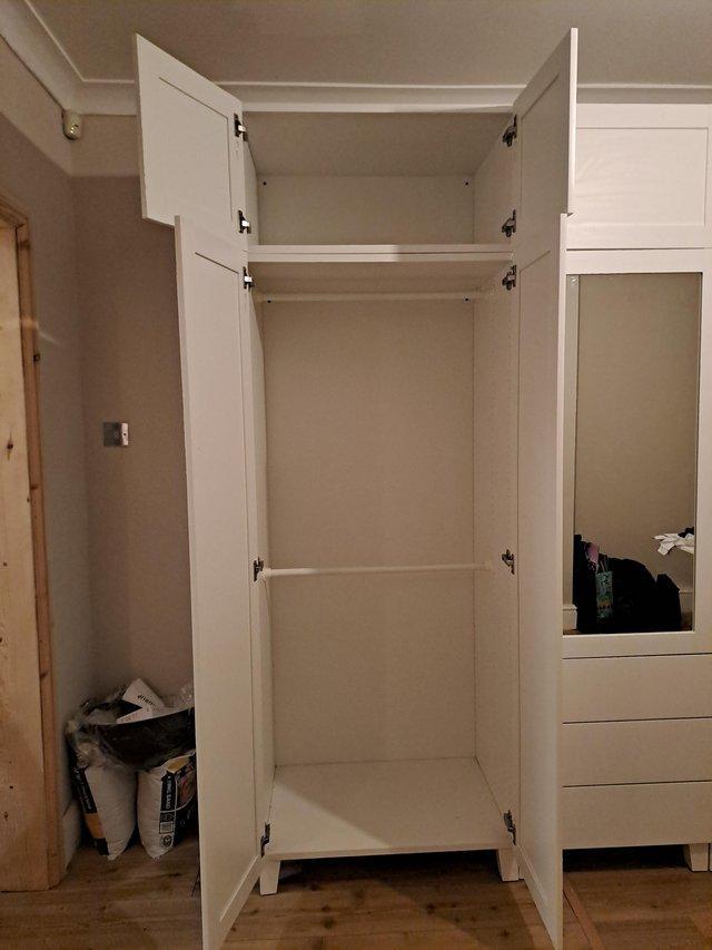 Preview of the first image of IKEA Platsa  white wardrobe with mirrow.
