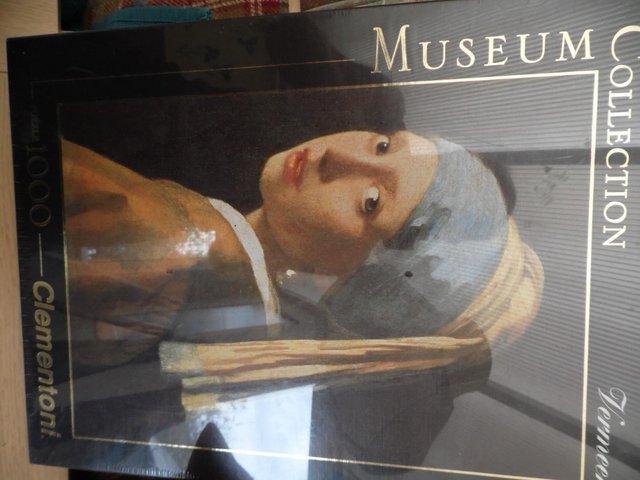 Preview of the first image of 1,000 piece Jigsaw - 'Girl with a Pearl Earring'.