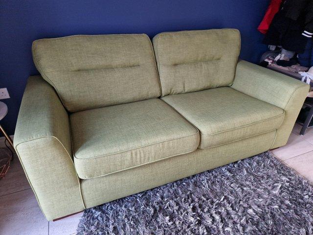 Preview of the first image of Green 3 Seater Cloth Sofa (removeable covers).