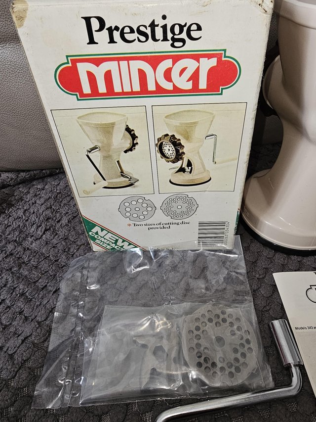 Preview of the first image of Vintage prestige mincer Retro suction plate lever action new.