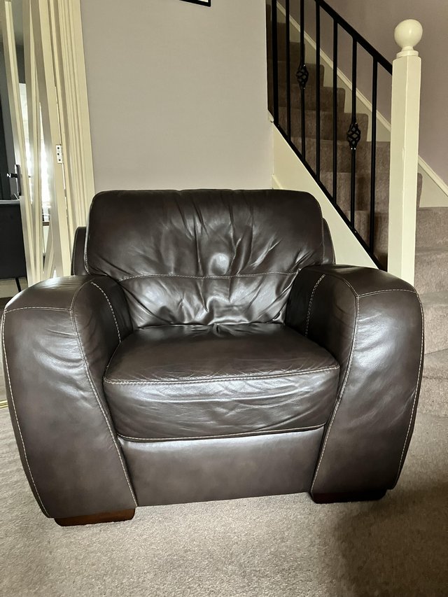 Preview of the first image of Leather two seater sofa and chair Dark Brown.
