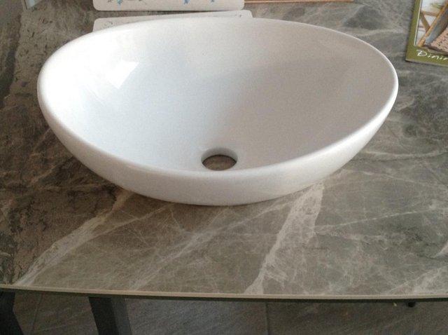 Preview of the first image of Good home Nessa white oval wash basin.