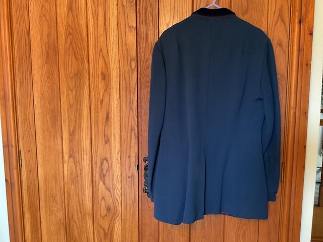 Preview of the first image of Blue show jumping jacket size 12.