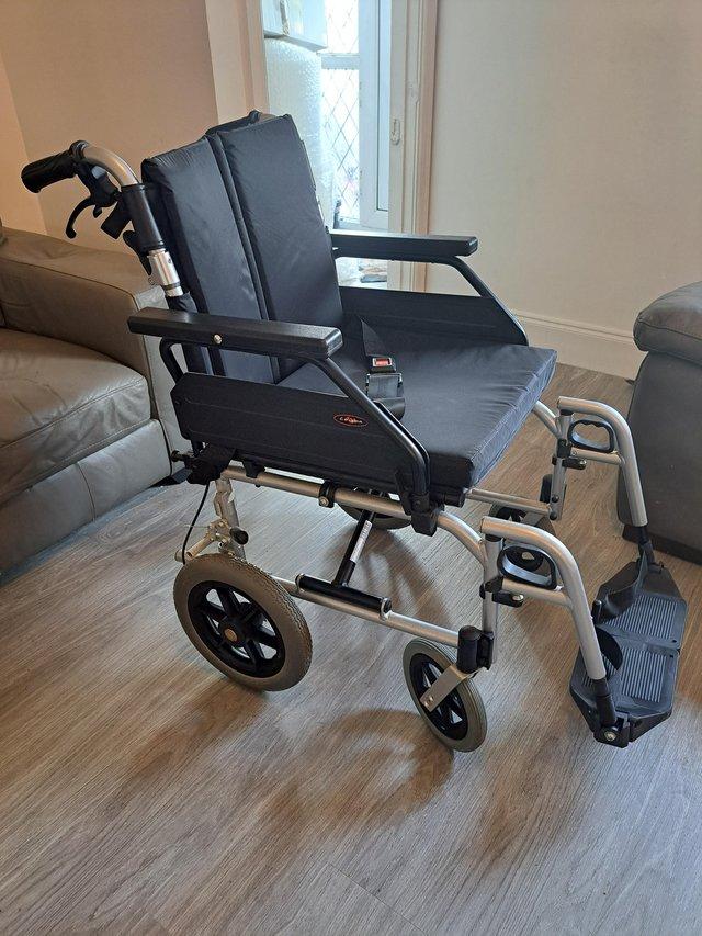 Preview of the first image of Folding wheelchair in new condition.