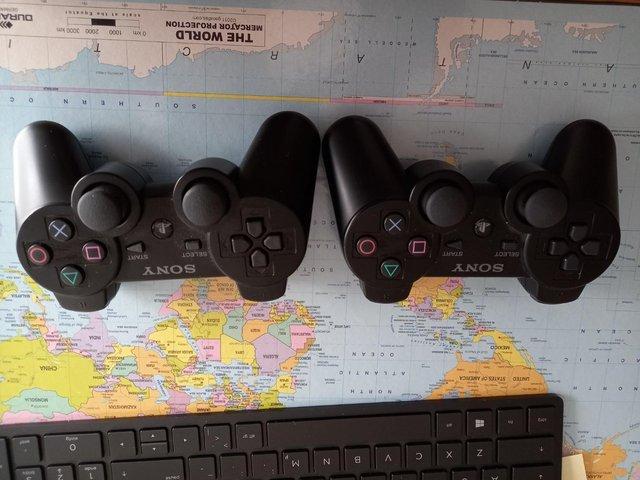 Preview of the first image of Two PS3 Black controls excellent condition..