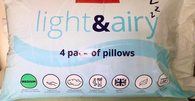 Preview of the first image of 4 X NEW SLUMBERLAND LUXURY PILLOWS IN SEALED PACKING.