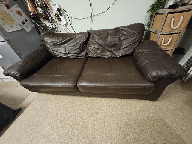 Preview of the first image of Free  - 3 seater Brown Faux Leather Sofa.