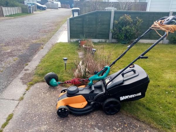Image 2 of Worx electric lawn mower and Bosch strimmer.