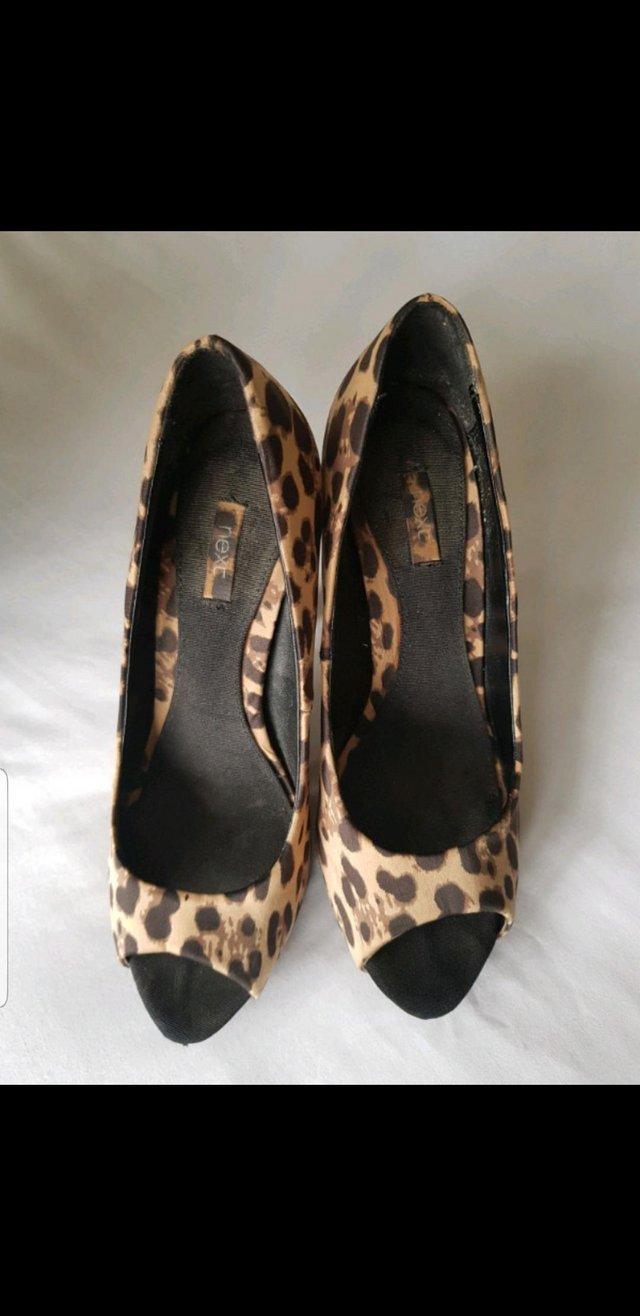 Preview of the first image of Ladies Leopard print peep toe size 5.