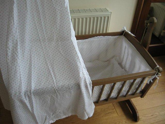 Preview of the first image of John Lewis baby crib in good condition.