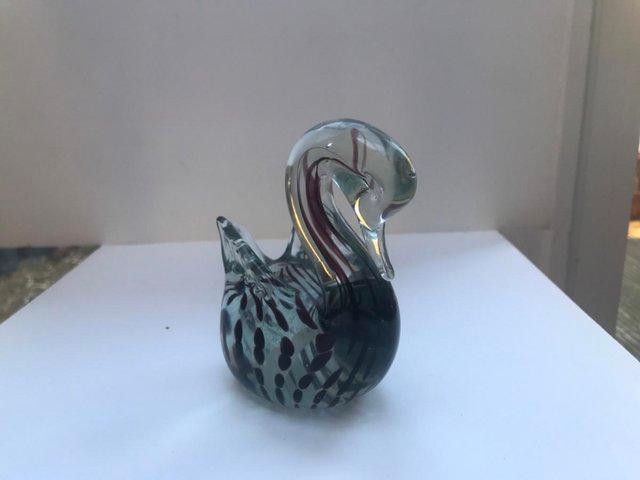Preview of the first image of Glass swan 1980s brown and white marketing.