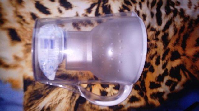 Image 2 of White and clear water filter jug.