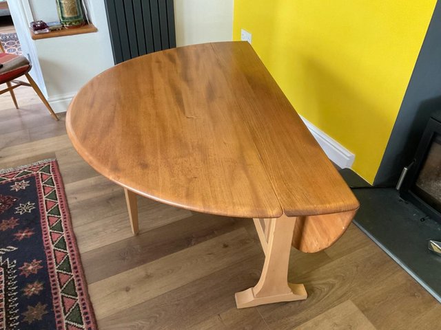 Preview of the first image of Ercol vintage drop leaf dining table.
