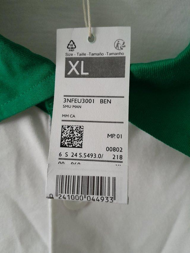 Preview of the first image of Mens benetton rugby shirt XL.