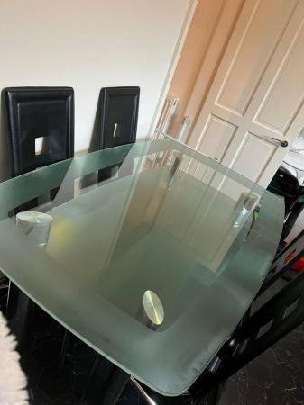 Image 2 of Stylish 2 tier curved glass dining table with 4 chairs