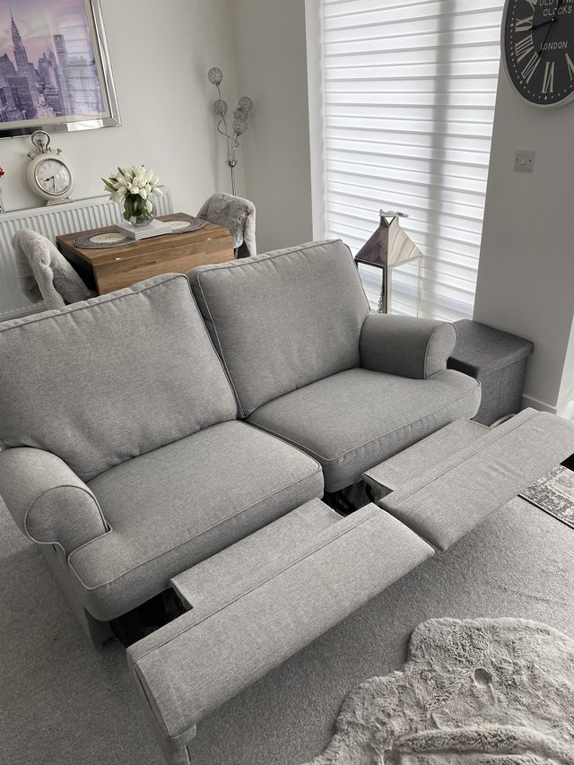 Preview of the first image of Two Seater M&S Recliner Sofa Light Grey.