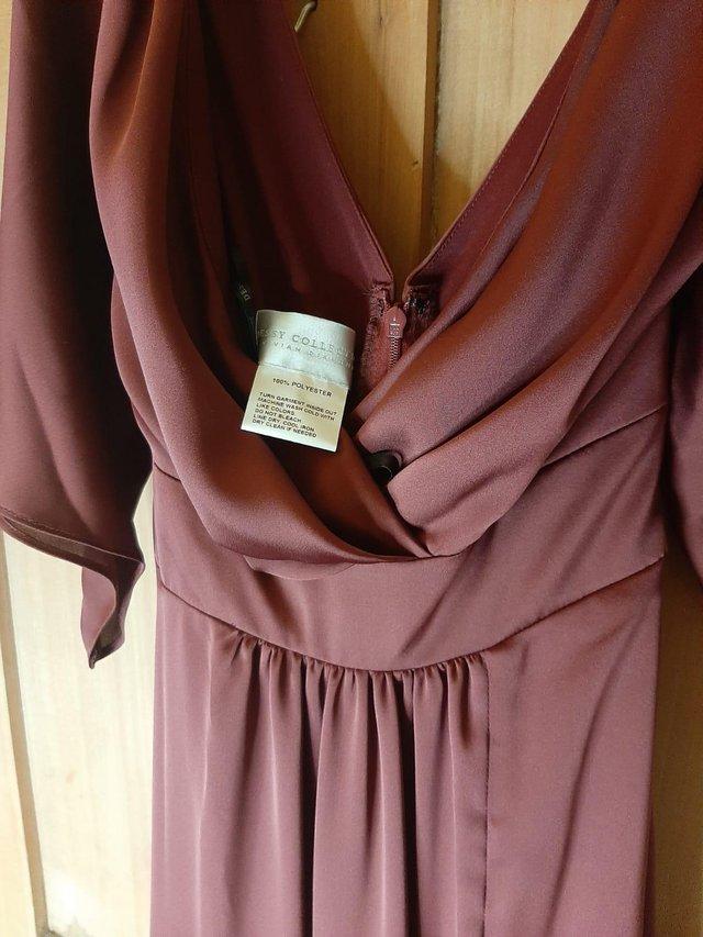 Preview of the first image of Bridesmaid dress - unused - ready to go to a new home!.