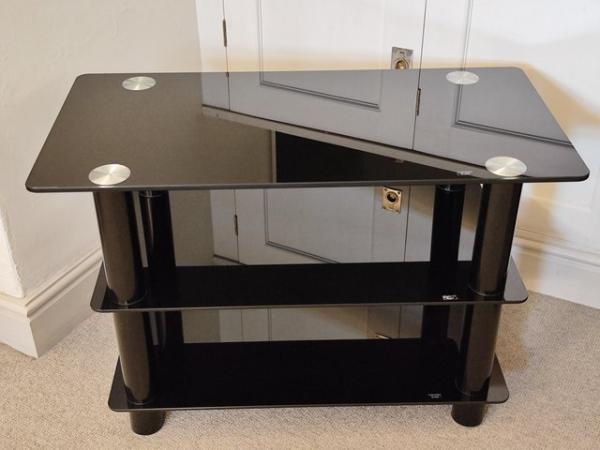 Image 1 of Black glass shelved TV table