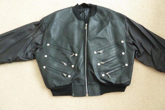 Preview of the first image of Men's Stylish Black PVC Retro Jacket.